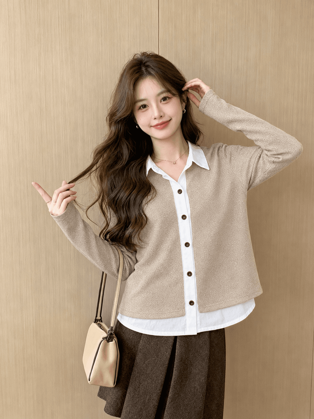 명문 여성 바람 배색 페이크 레이어드 니트 패치워크 여성 셔츠 2026 가을 새로운 폴로 칼라 싱글 줄 버튼 오픈 가디건 상세 이미지 2