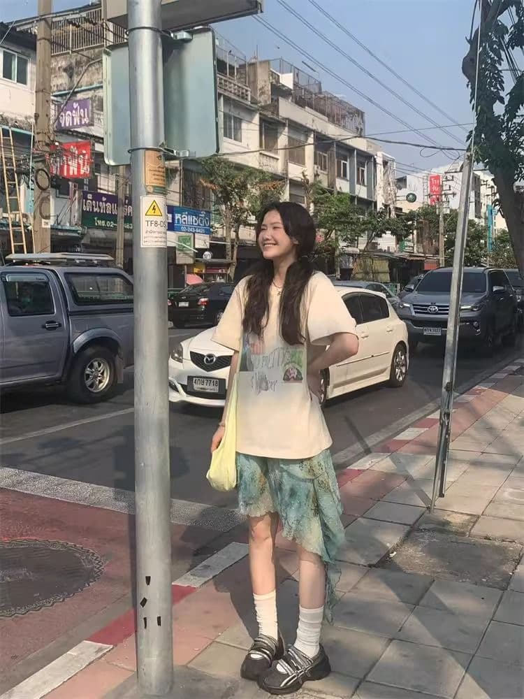 아메리칸 레트로 디자인 센스 작은 대중 프린트 반신 스커트 여성 여름 새로운 다용도 불규칙 높은 품질 중간 길이 스커트 상세 이미지 7