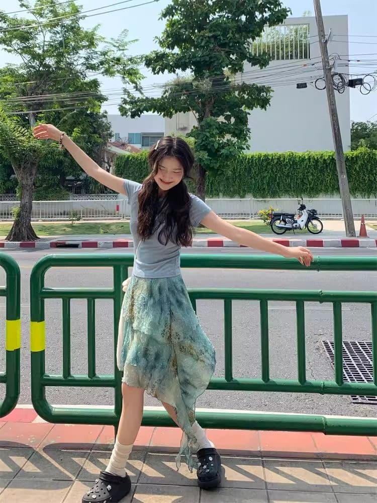 아메리칸 레트로 디자인 센스 작은 대중 프린트 반신 스커트 여성 여름 새로운 다용도 불규칙 높은 품질 중간 길이 스커트 상세 이미지 10