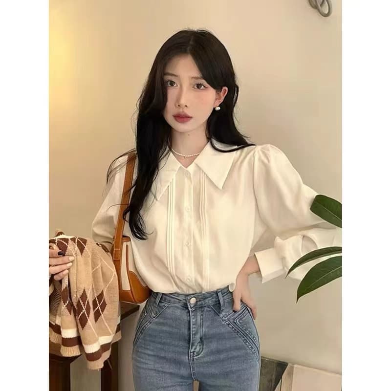 프랑스식 폴로 칼라 도루 센스 화이트 여성 셔츠 디자인 센스 작은 대중 루즈핏 맨위 품격 레트로 거품 소매 셔츠 얇은 스타일