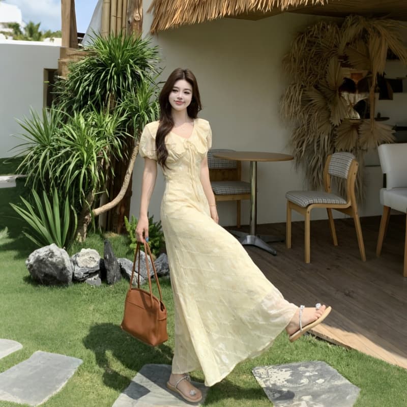 부드러운 바람 V넥 레이스업 프릴 여성 드레스 2026 여름 새로운 자카드 허리 수축 슬림해 보이는 롱 코트 치마 이미지 5