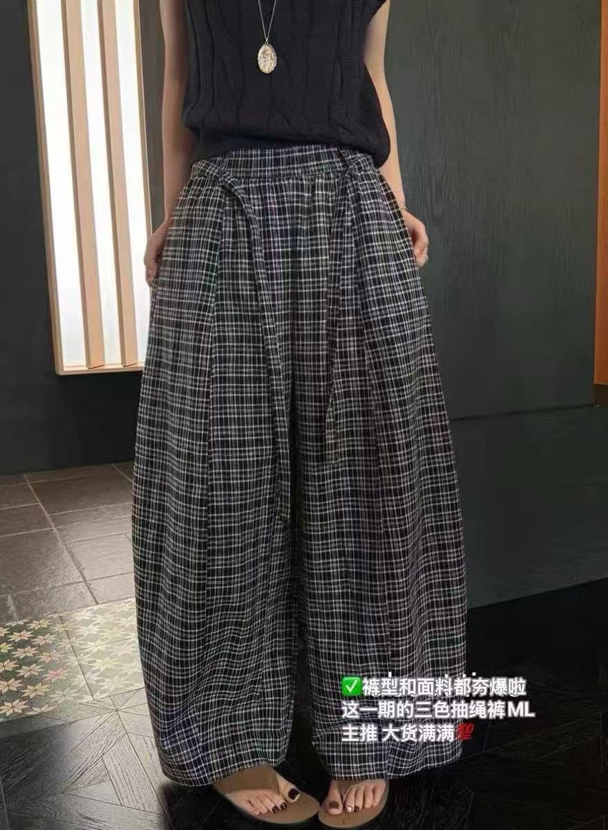 유럽 역 품격 주황색 커피 체크무늬 와이드 레그 팬츠 2026 느긋한 바람 허리밴드 루즈핏 도루 센스 캐주얼 바지 상세 이미지 2