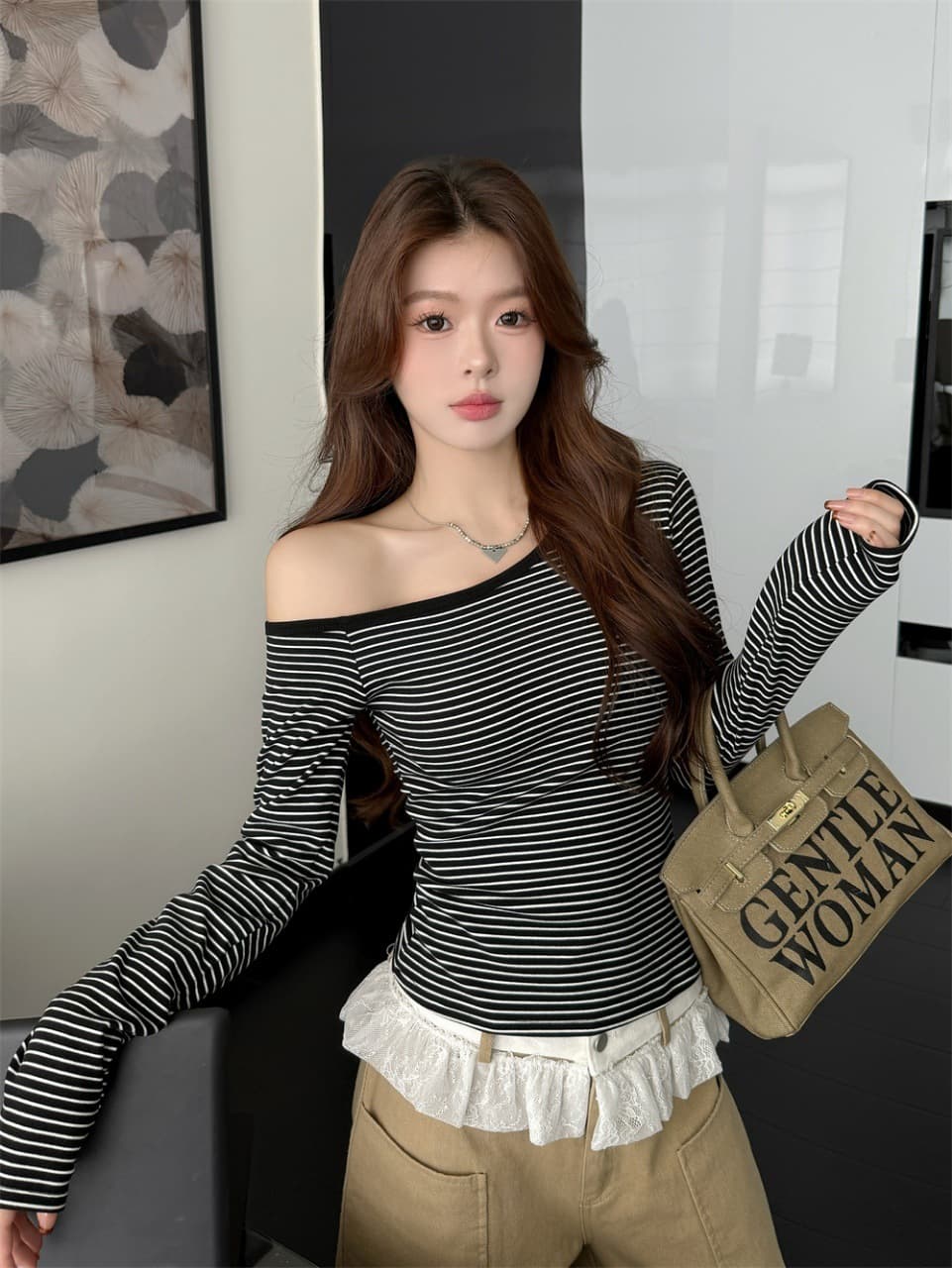 이른 가을 새로운 순수한 욕망 양모 스트라이프 비스듬한 어깨 보온 긴팔 티셔츠 여성 몸매 가꾸기 고정 벨트 가슴 패드 슬림해 보이는 상세 이미지 20