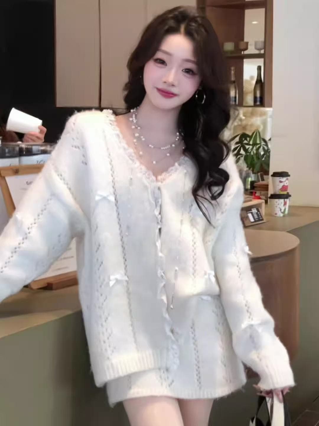 느긋한 부드러운 바람 홀로우 아웃 나비 매듭 니트 오픈 가디건 반신 치마 세트 여성 가을 겨울 고급 센스 스웨터 투피스 세트 상세 이미지 10