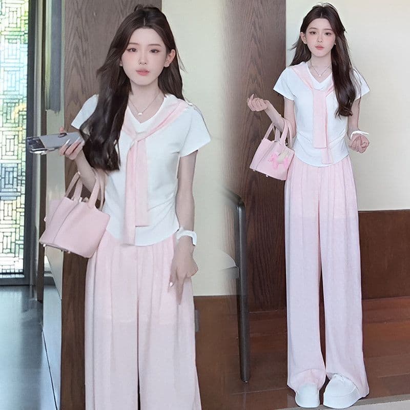 여름 새로운 미니멀리즘 패션 세트 디자인 Chic 페이크 레이어드 맨위 짧은 티셔츠 와이드 레그 팬츠 투피스 세트 이미지 2