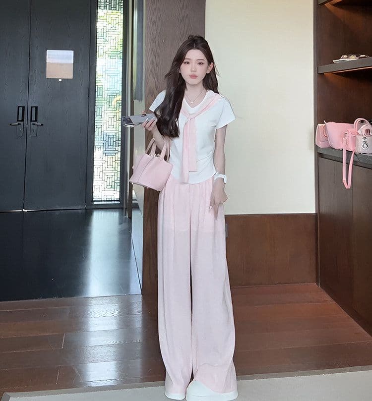 여름 새로운 미니멀리즘 패션 세트 디자인 Chic 페이크 레이어드 맨위 짧은 티셔츠 와이드 레그 팬츠 투피스 세트 상세 이미지 2