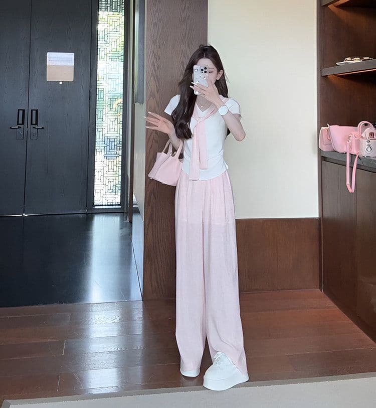 여름 새로운 미니멀리즘 패션 세트 디자인 Chic 페이크 레이어드 맨위 짧은 티셔츠 와이드 레그 팬츠 투피스 세트 상세 이미지 3
