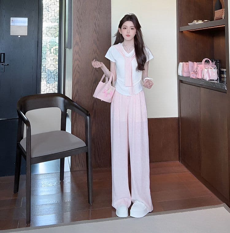 여름 새로운 미니멀리즘 패션 세트 디자인 Chic 페이크 레이어드 맨위 짧은 티셔츠 와이드 레그 팬츠 투피스 세트 상세 이미지 9