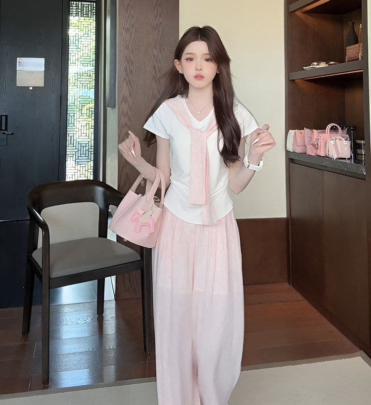 여름 새로운 미니멀리즘 패션 세트 디자인 Chic 페이크 레이어드 맨위 짧은 티셔츠 와이드 레그 팬츠 투피스 세트 상세 이미지 10
