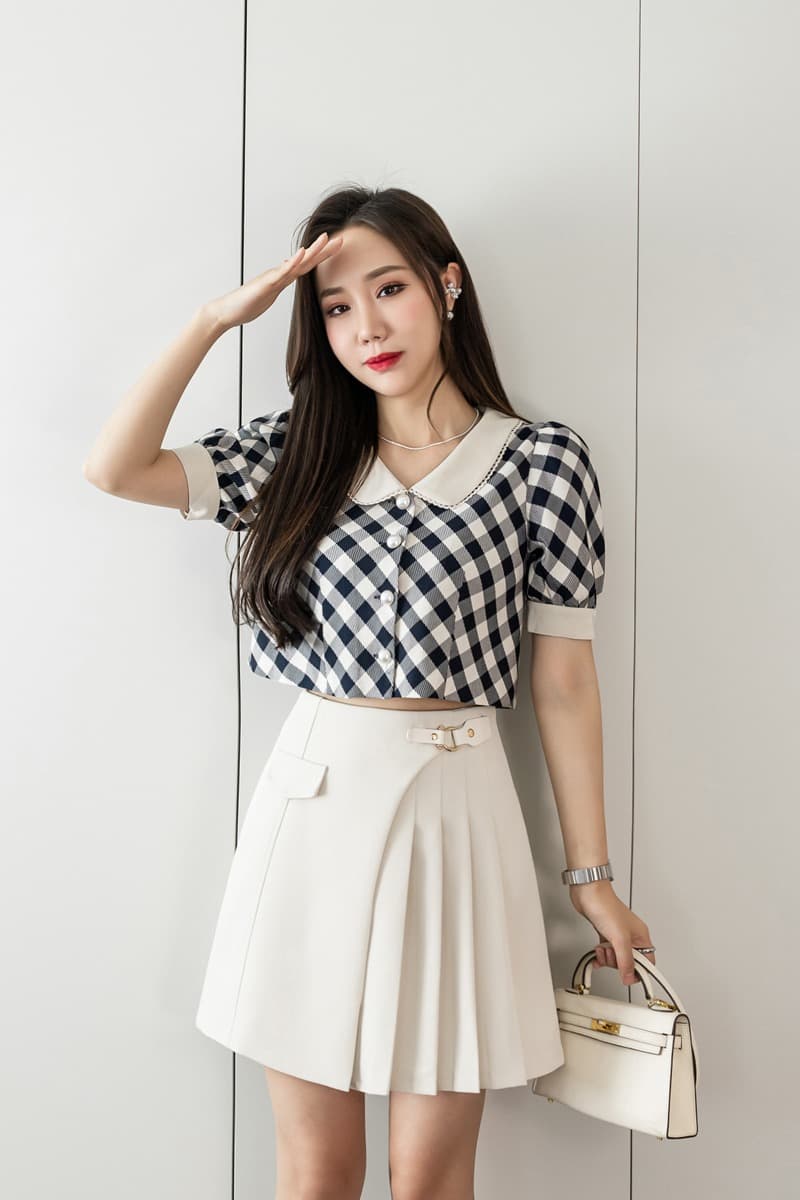 플리츠 미니 스커트 여성 2026 여름 새로운 하이웨이스트 한 마디 반신 스커트 주름 불규칙 노출 방지 반바지 반 스커트 이미지 7