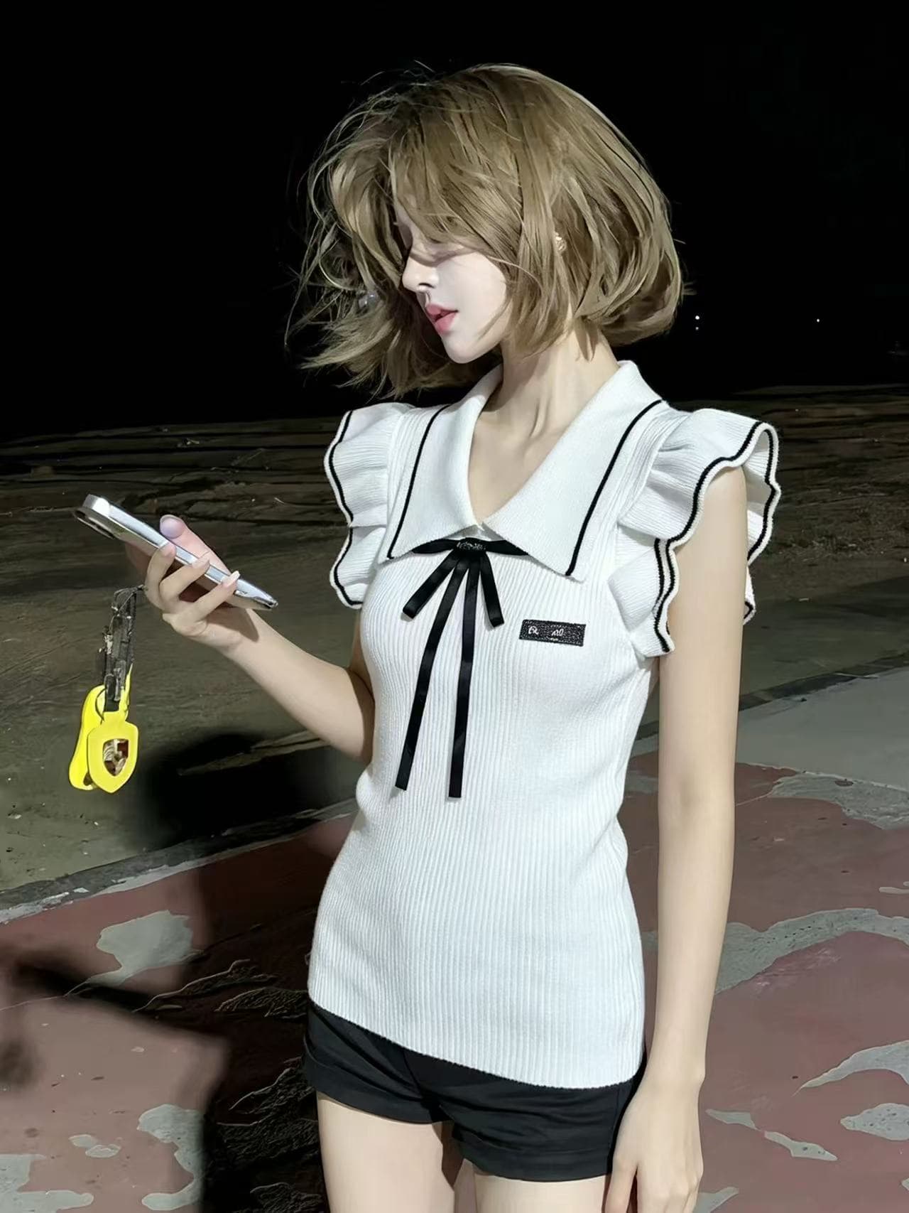 lym studio 작은 날다 소매 폴로 칼라 나비 매듭 니트 스웨터 여성 화이트 연령 감소 몸매 가꾸기 달콤한 자매 맨위