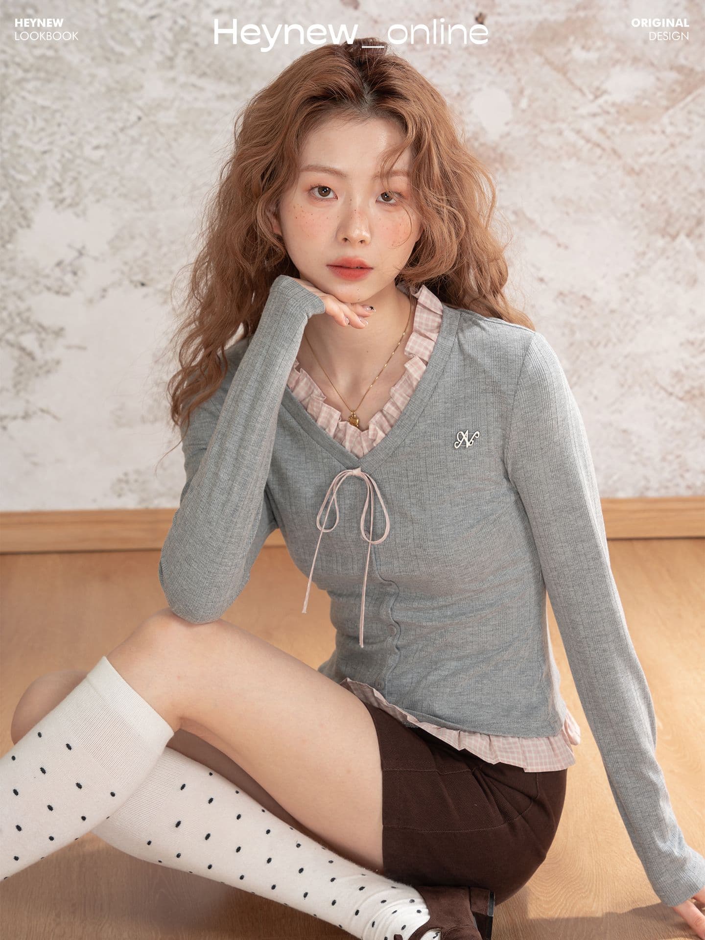 양모 한 부서 체크무늬 패치워크 긴팔 티셔츠 여성 2026 가을 새로운 Chic 페이크 레이어드 디자인 작은 대중 맨위