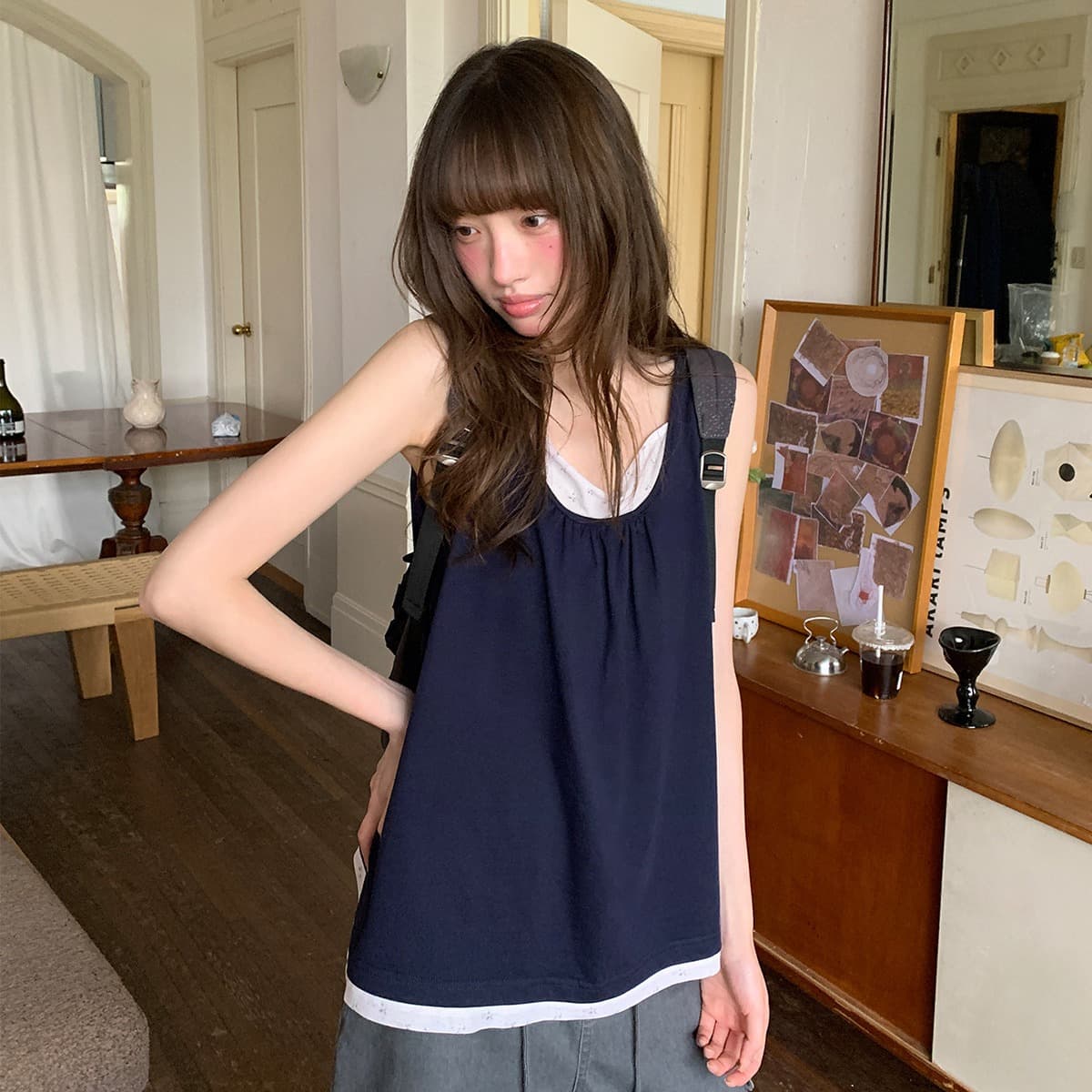 안녕하세요. 대포 페이크 레이어드 패치워크 조끼 여성 여름 새로운 한 부서 작은 루즈핏 디자인 센스 니트 스웨터 맨위