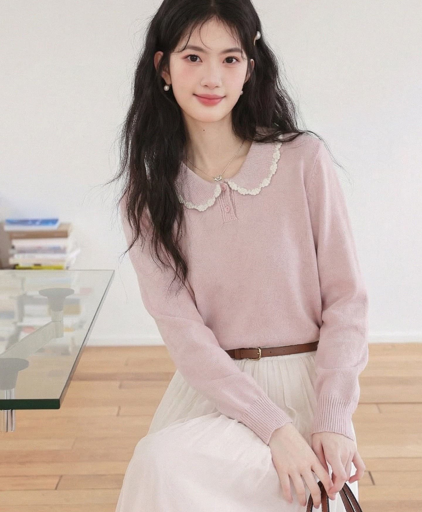 달콤함 베이비 칼라 핑크색 니트 스웨터 여성 2026 봄 가을 새로운 디자인 센스 작은 대중 루즈핏 긴팔 맨위