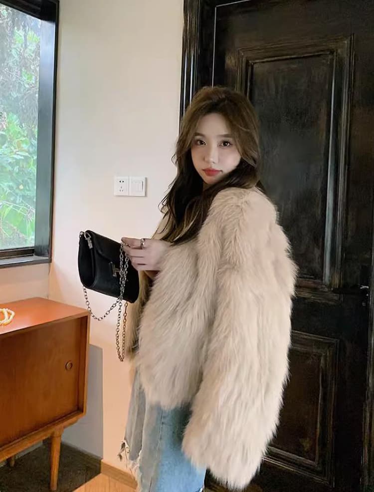 안개가 자욱한 소녀 겨울 새로운 모방 여우털 모피 영 섹션 솜을 넣은 두꺼운 환경 보호 모피 여성 코트 상세 이미지 7