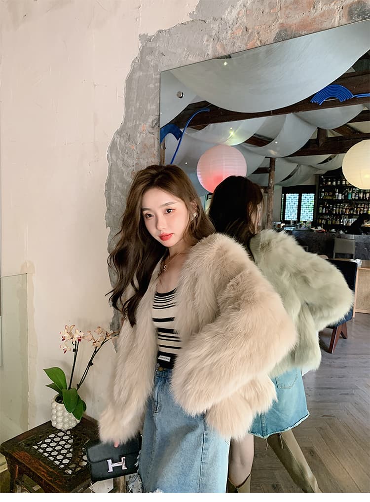 안개가 자욱한 소녀 겨울 새로운 모방 여우털 모피 영 섹션 솜을 넣은 두꺼운 환경 보호 모피 여성 코트 상세 이미지 9
