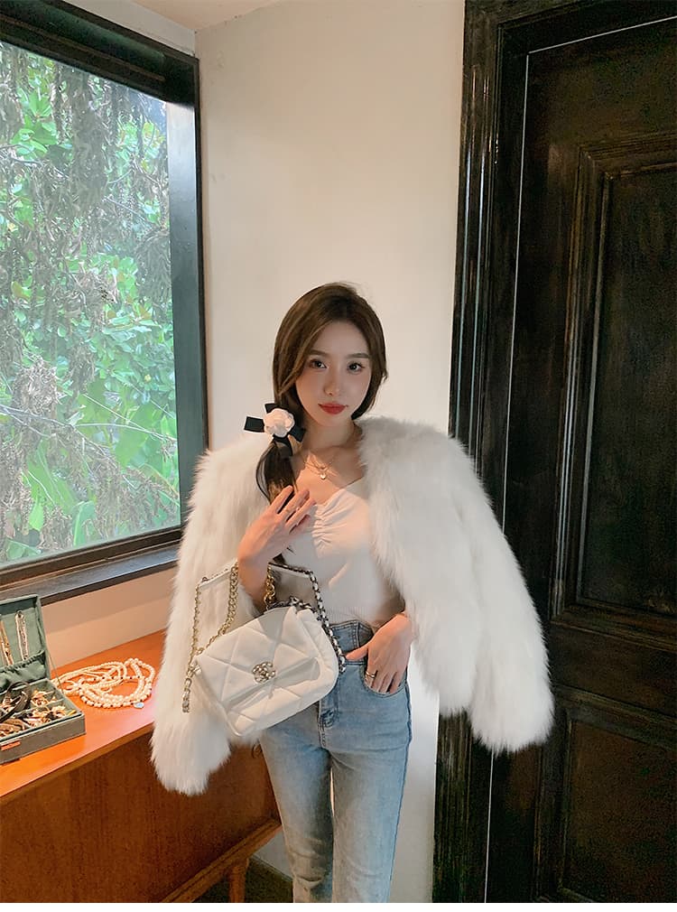 안개가 자욱한 소녀 겨울 새로운 모방 여우털 모피 영 섹션 솜을 넣은 두꺼운 환경 보호 모피 여성 코트 상세 이미지 17