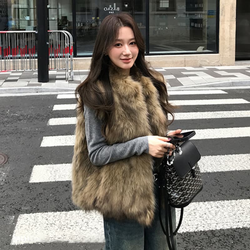 한국 스타일 환경 보호 여우털 조끼 영 섹션 모피 조끼 여자 겨울 새로운 민소매 조끼 모방 모피 재킷