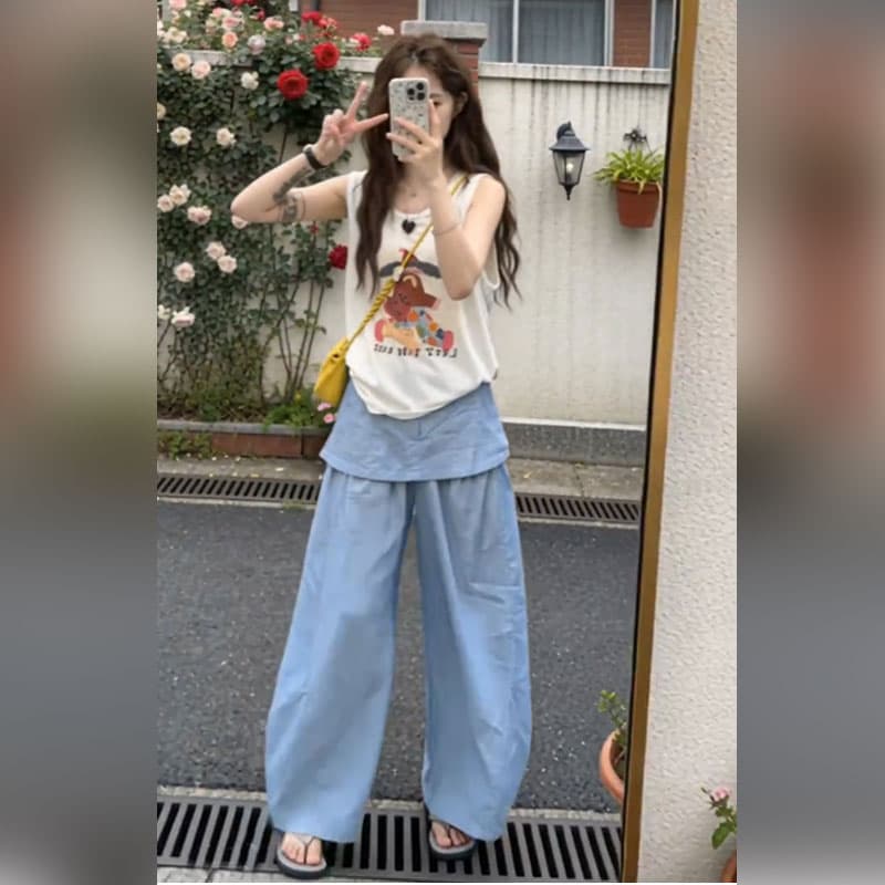 여름 디자인 센스 작은 대중 외출용 만화 프린트 루즈핏 민소매 조끼 맨위 디자인 센스 캐주얼 바지 두 조각 여성 세트 이미지 2