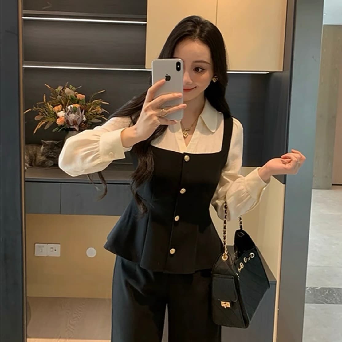 높은 추위 로얄 자매 바람 2026 가을 검정색 페이크 레이어드 패치워크 고유 한 올인원 바지 위엄있는 대기 슬림해 보이는 품격 여성 상세 이미지 2