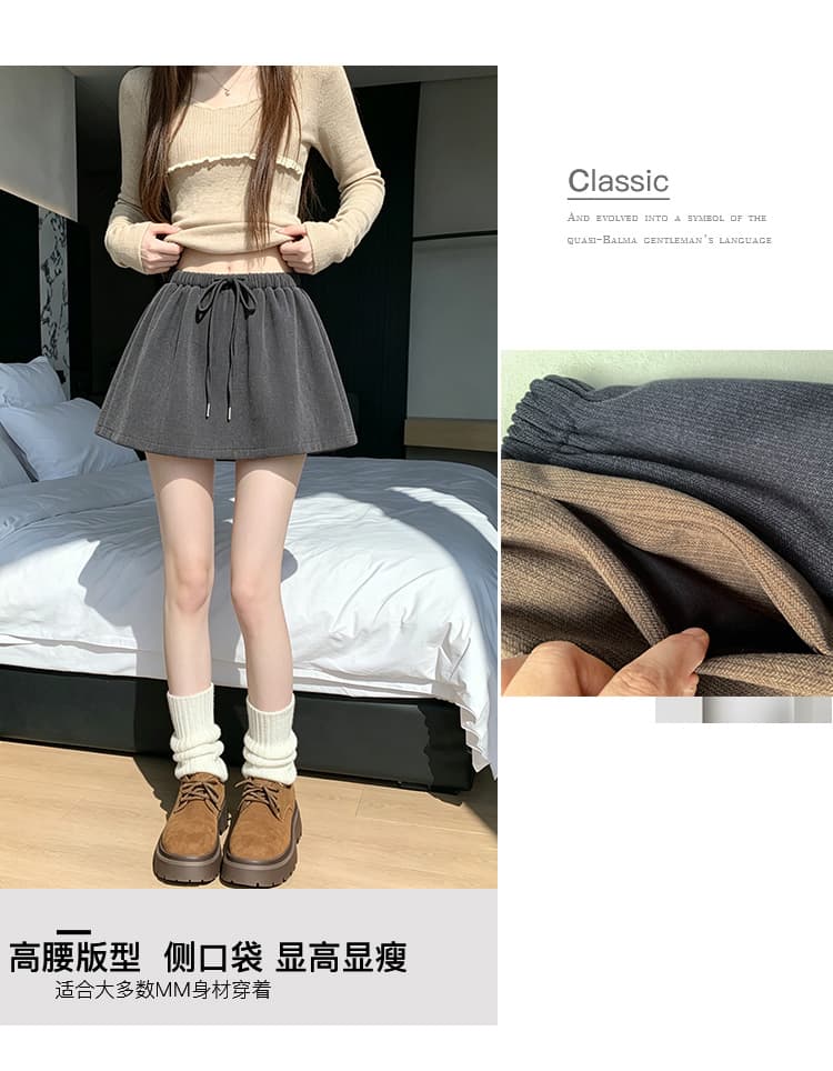 실사 2026 새로운 세로 줄무늬 모직 노출 방지 반신 스커트 허리밴드 빅 사이즈 루즈핏 디자인 센스 치마 아이들 상세 이미지 3