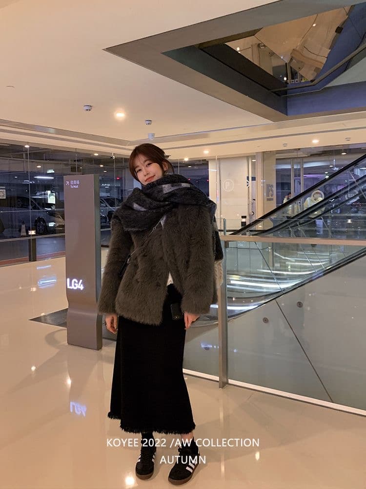 품격 술 측면 니트 스트레이트 회색 반신 스커트 여성 가을 겨울 하이웨이스트 이후 트임 디자인 센스 중간 길이 치마 이미지 3