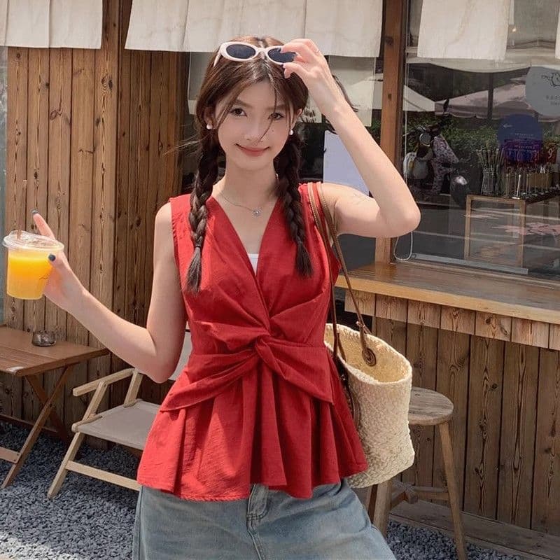 디자인 센스 비틀림 V넥 조끼 여성 2026 여름 새로운 휴가 바람 작은 대중 몸매 가꾸기 Chic 민소매 맨위 상세 이미지 7