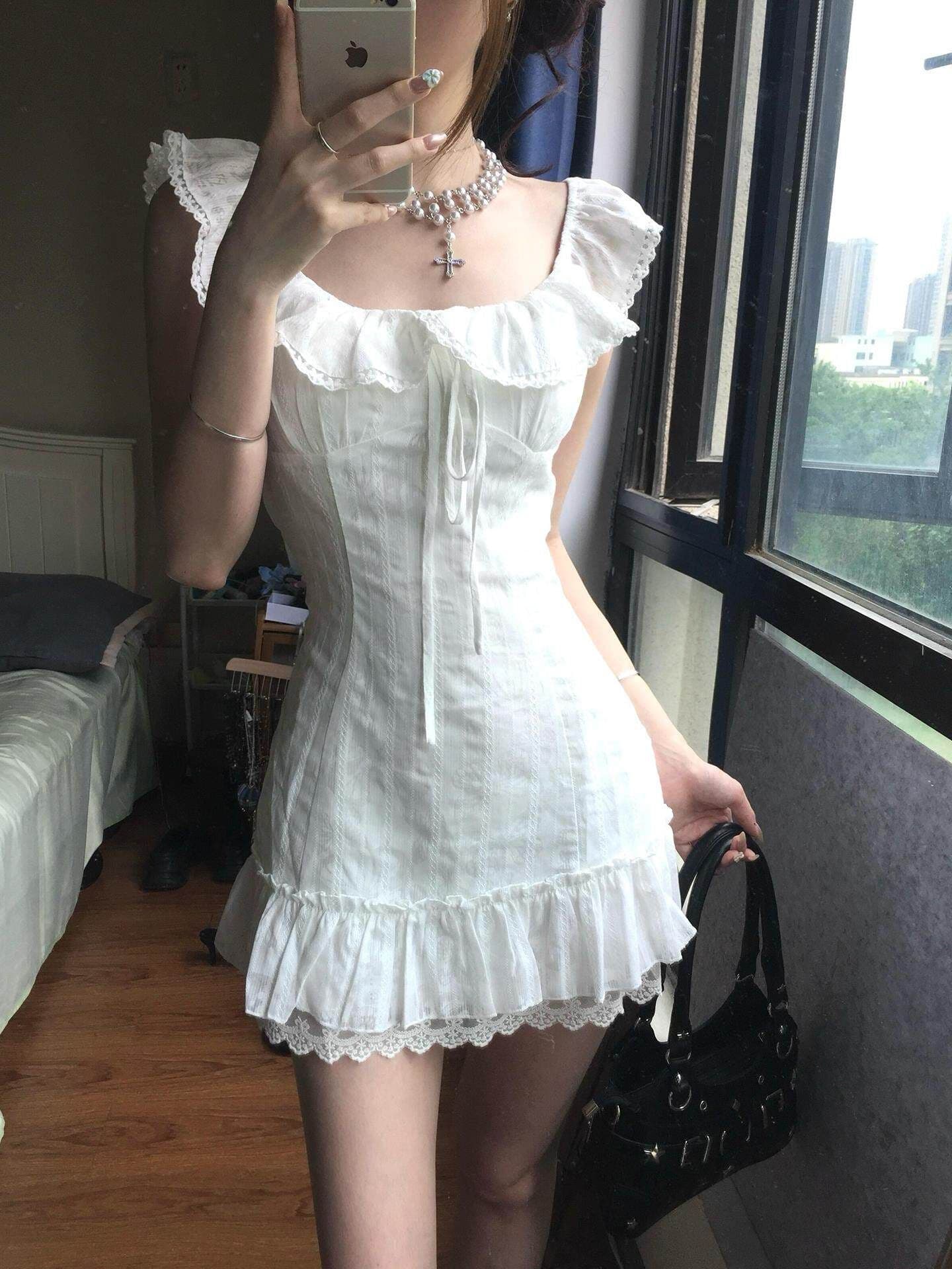 프랑스식 첫사랑 화이트 작은 날다 소매 여성 드레스 여름 2026 새로운 자이언트 잘 생긴 ~ 중 프릴 쇼트 스타일 짧은 치마