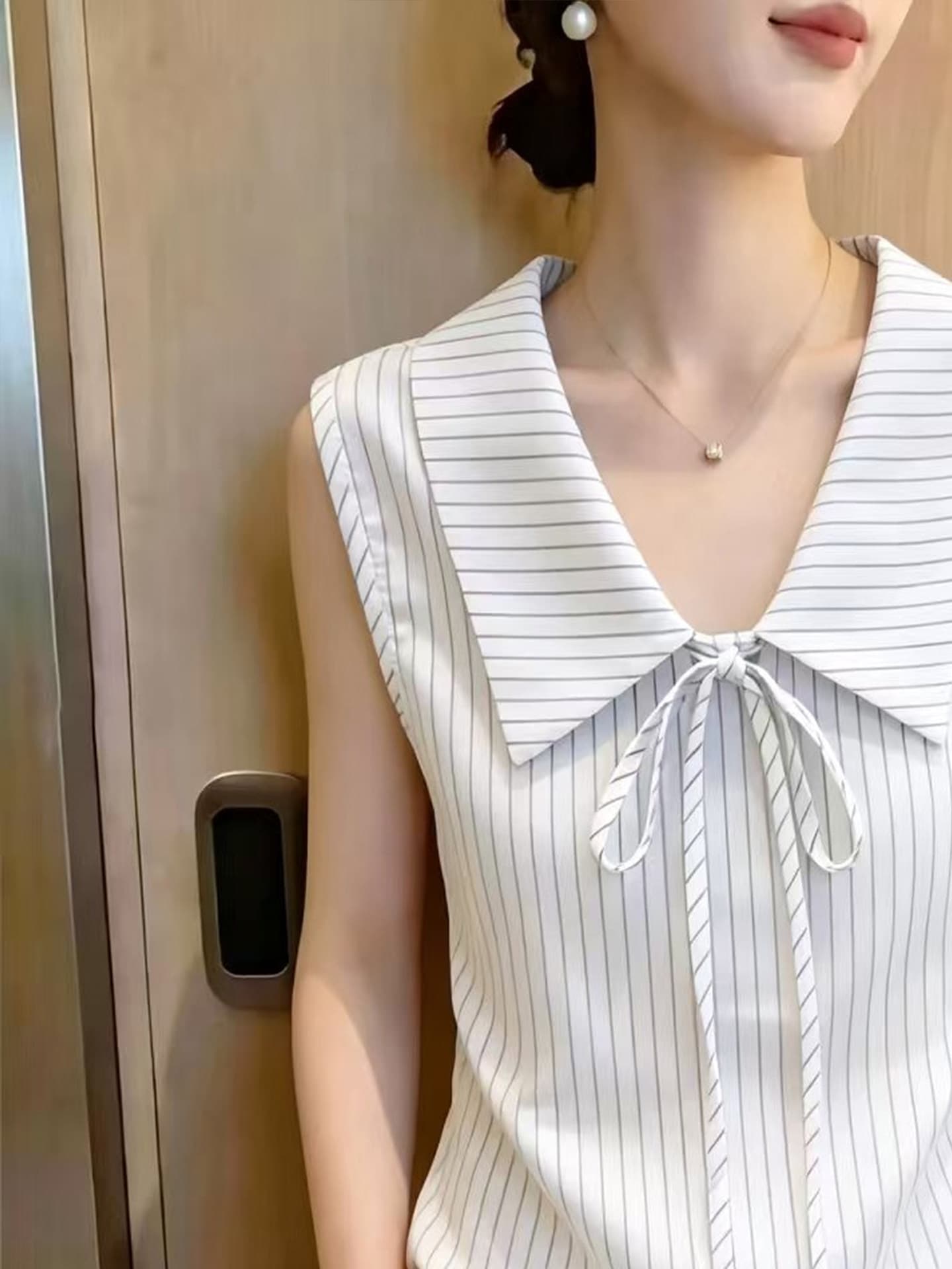 광저우 열세 개 여성 의류 스트라이프 민소매 여성 셔츠 여름 새로운 나비 넥타이 POLO 칼라 출퇴근 맨위 상세 이미지 2
