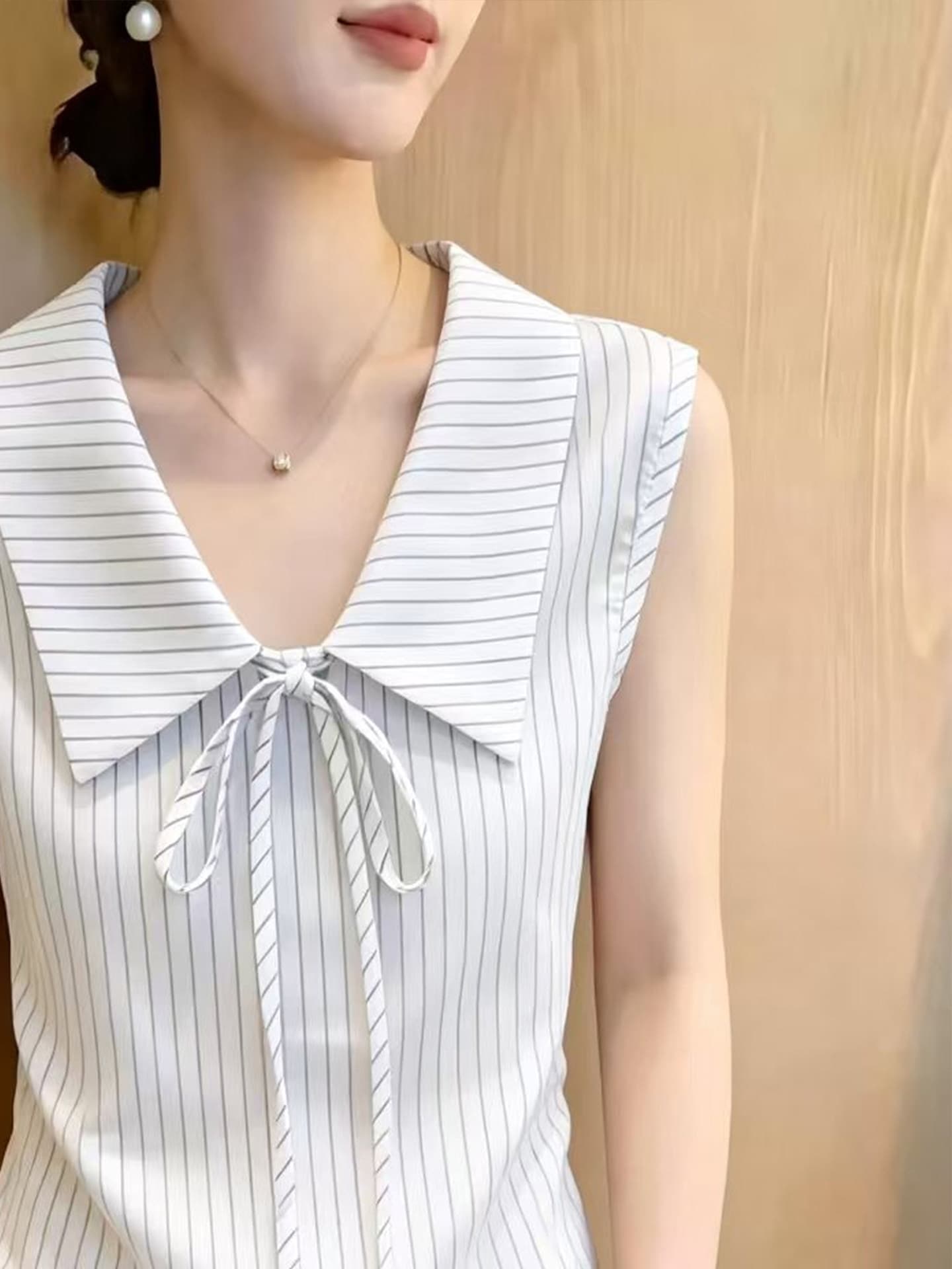 광저우 열세 개 여성 의류 스트라이프 민소매 여성 셔츠 여름 새로운 나비 넥타이 POLO 칼라 출퇴근 맨위 상세 이미지 3