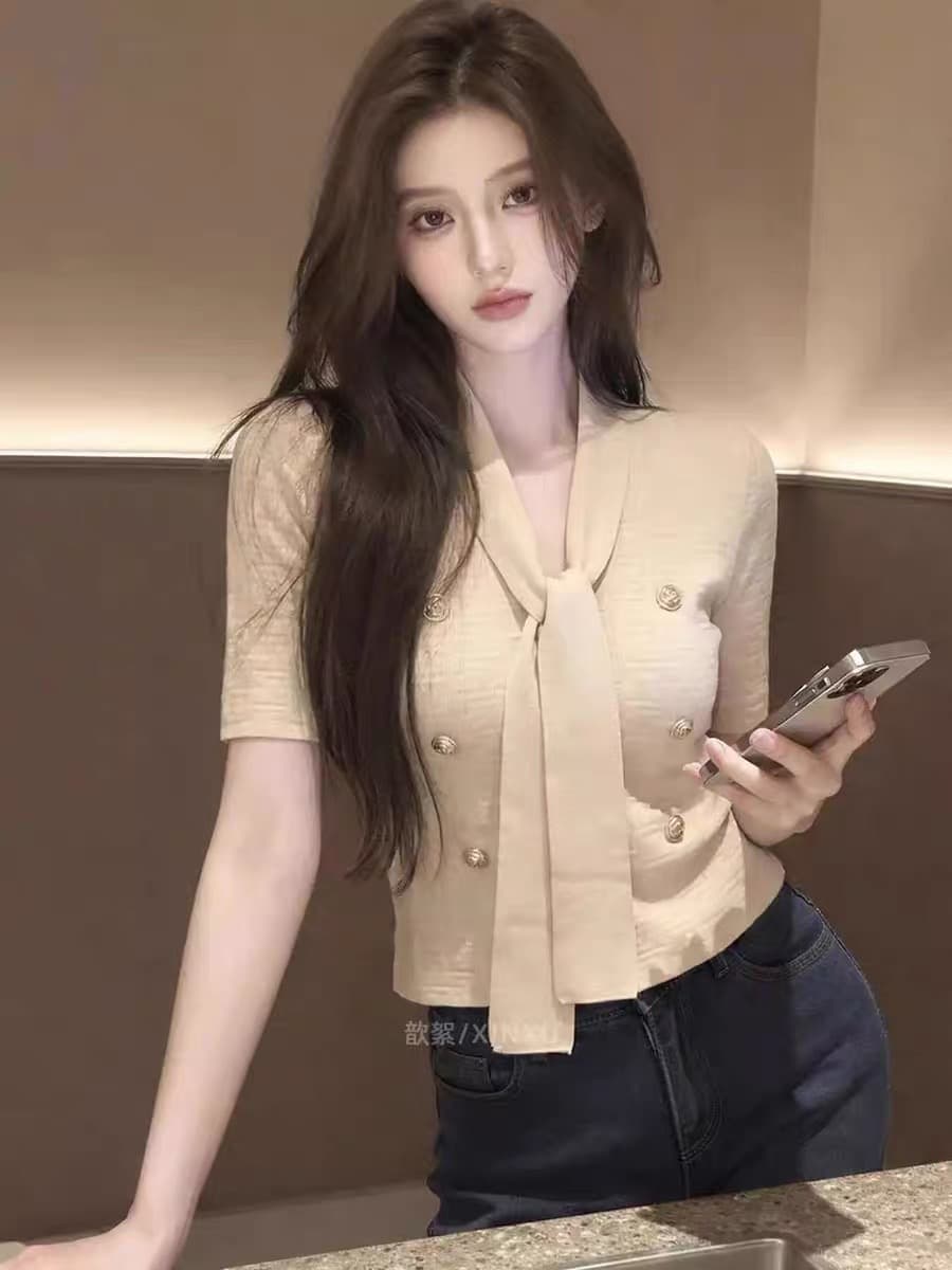 한국 스타일 살구 색상 니트 스웨터 여성 2026 여름 새로운 몸매 가꾸기 레이스업 패션 개성 Chic 작은 대중 연령 감소 맨위