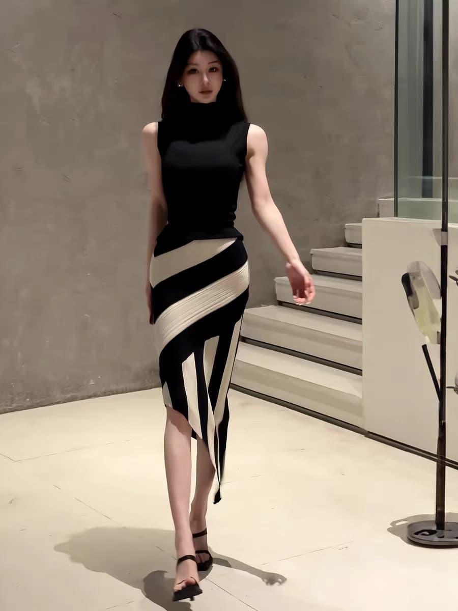 jijinqi 여름 캐주얼 다용도 타이트 밴딩 반신 스커트 출퇴근 다용도 슬림해 보이는 불규칙 비스듬한 진자 반 스커트 이미지 4