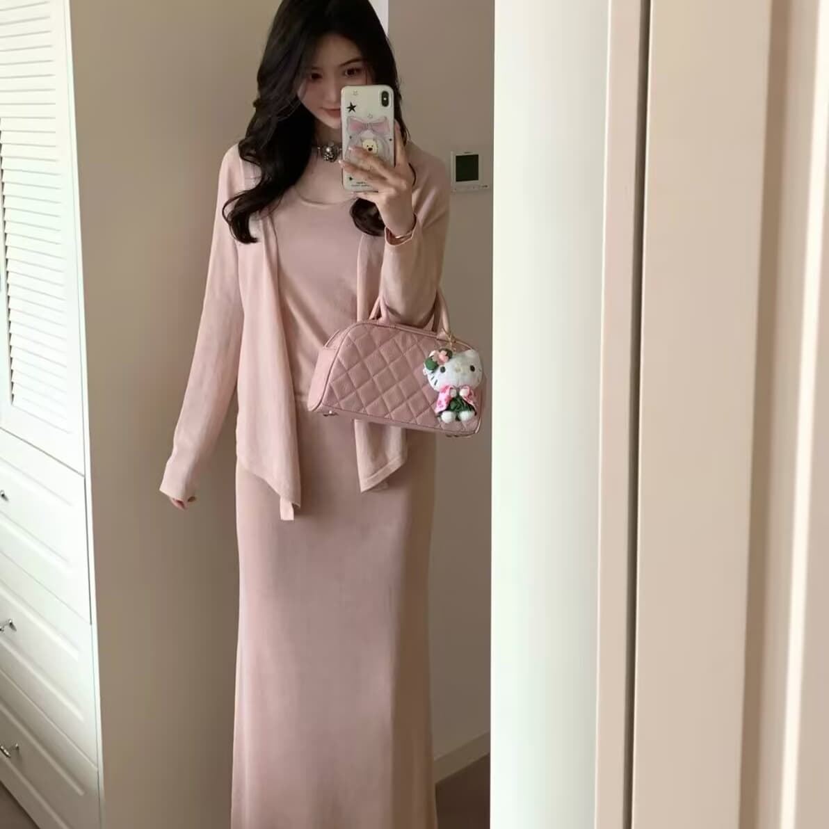 핑크색 슬립 긴팔 오픈 가디건 이른 봄 아름다운 세트 여성 2026 한 마디 반신 스커트 3종 세트