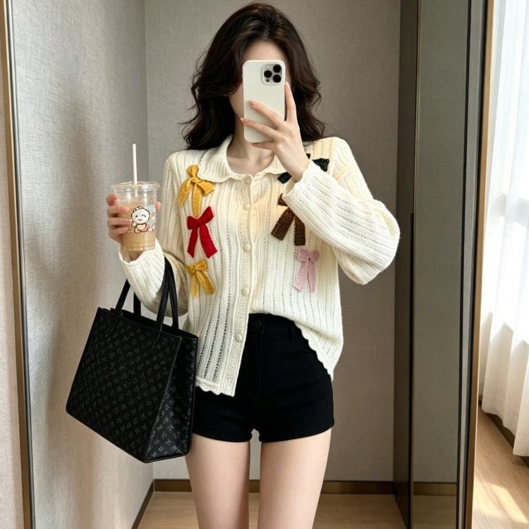 색상 나비 매듭 홀로우 아웃 니트 스웨터 여성 2026 새로운 가을 달콤함 연령 감소 디자인 고급 센스 긴팔 오픈 가디건