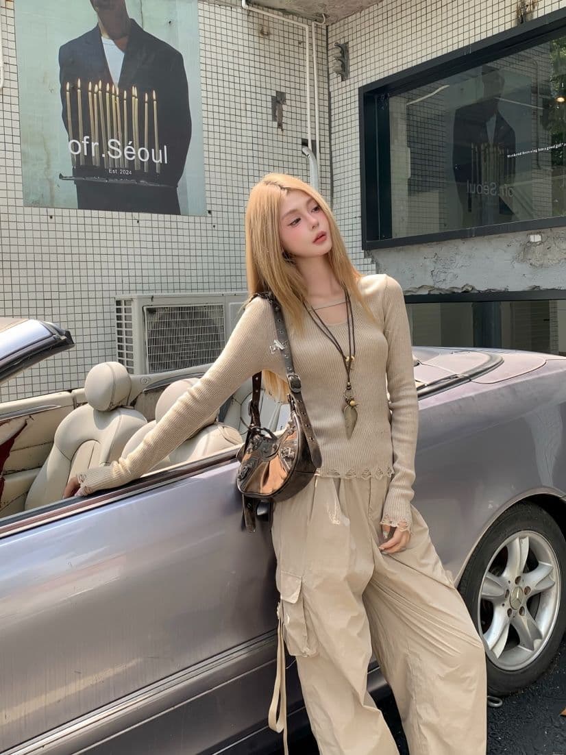 이른 가을 고유 한 Chic 작은 대중 디자인 고급 센스 슈퍼 잘 생긴 홀로우 아웃 술 몸매 가꾸기 핫걸 니트 긴 소매 맨위 상세 이미지 2