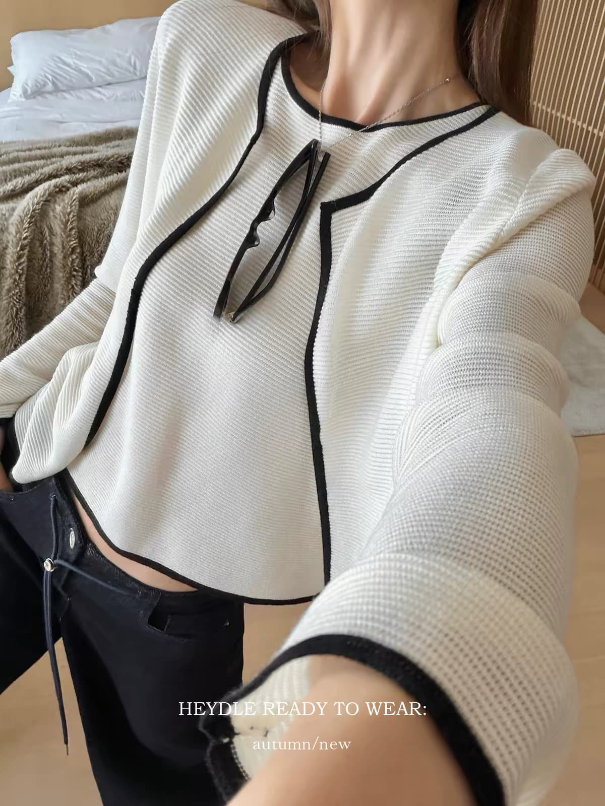 검은 콩 흠 부드러운 조용한 럭셔리 프랑스식 흑인과 백인 배색 니트 오픈 가디건 미니멀리즘 라운드 넥 민소매 투피스 조끼 상세 이미지 5