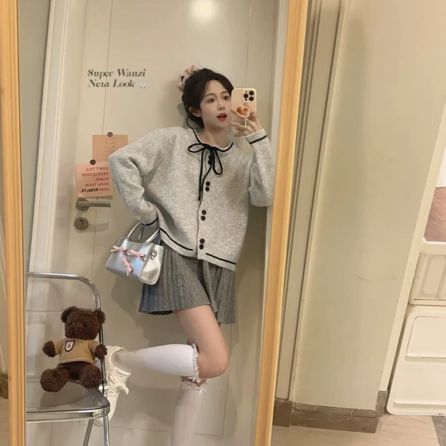 가을 새로운 한 부서 라운드 넥 레이스업 싱글 줄 버튼 긴팔 단색 루즈핏 양모 니트 스웨터 오픈 가디건 맨위 여성 상세 이미지 8