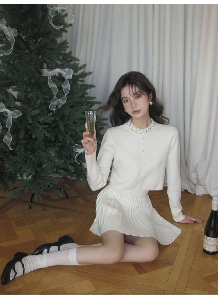 부드러운 바람 니트 세트 여성 새로운 비즈 박기 칼라 긴팔 오픈 가디건 하이웨이스트 플리츠 미니 스커트 투피스 세트 출퇴근 착용 가져 가라. 상세 이미지 22