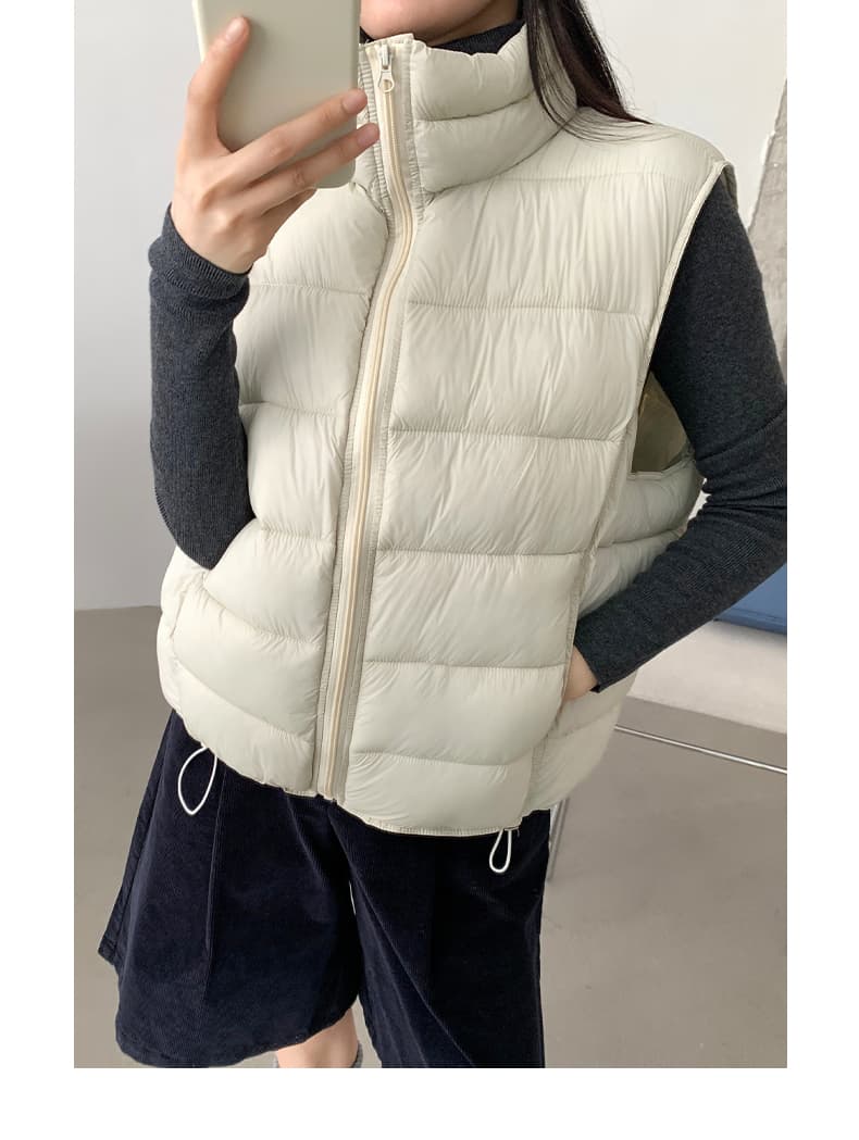 공정한 섬 양면 착용 양털 조끼 여자 외출용 겨울 두꺼운 보온 조끼 플리스 스탠드 칼라 면 의류 재킷 상세 이미지 32