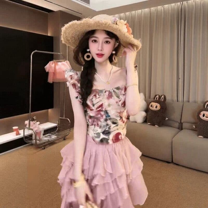 프랑스식 품격 유화 Feifei 소매 꽃무늬 맨위 불규칙 연꽃 잎 측면 길이 치마 세트 여성 여름 작은 대중 새로운