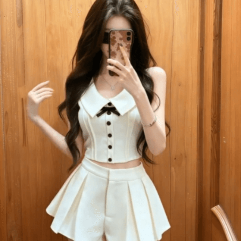 프랑스식 천 금빛 바람 세트 여성 여름 새로운 품격 폴로 칼라 나비 매듭 민소매 조끼 하이웨이스트 미니 스커트 투피스 세트 이미지 2