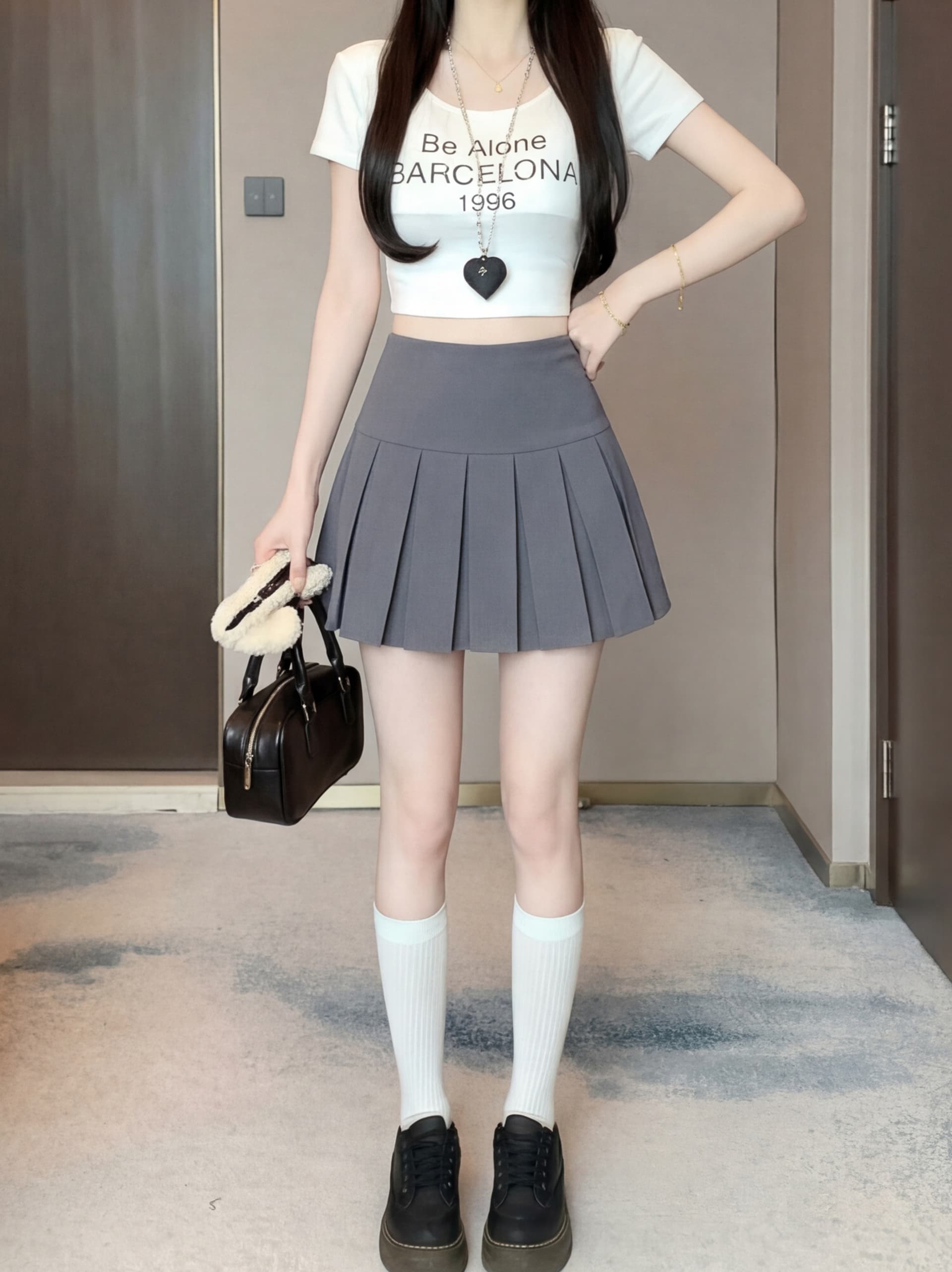 실사 2026 여름 새로운 단색 플리츠 스커트 패션 몸매 가꾸기 슬림해 보이는 A라인 스커트 이미지 2