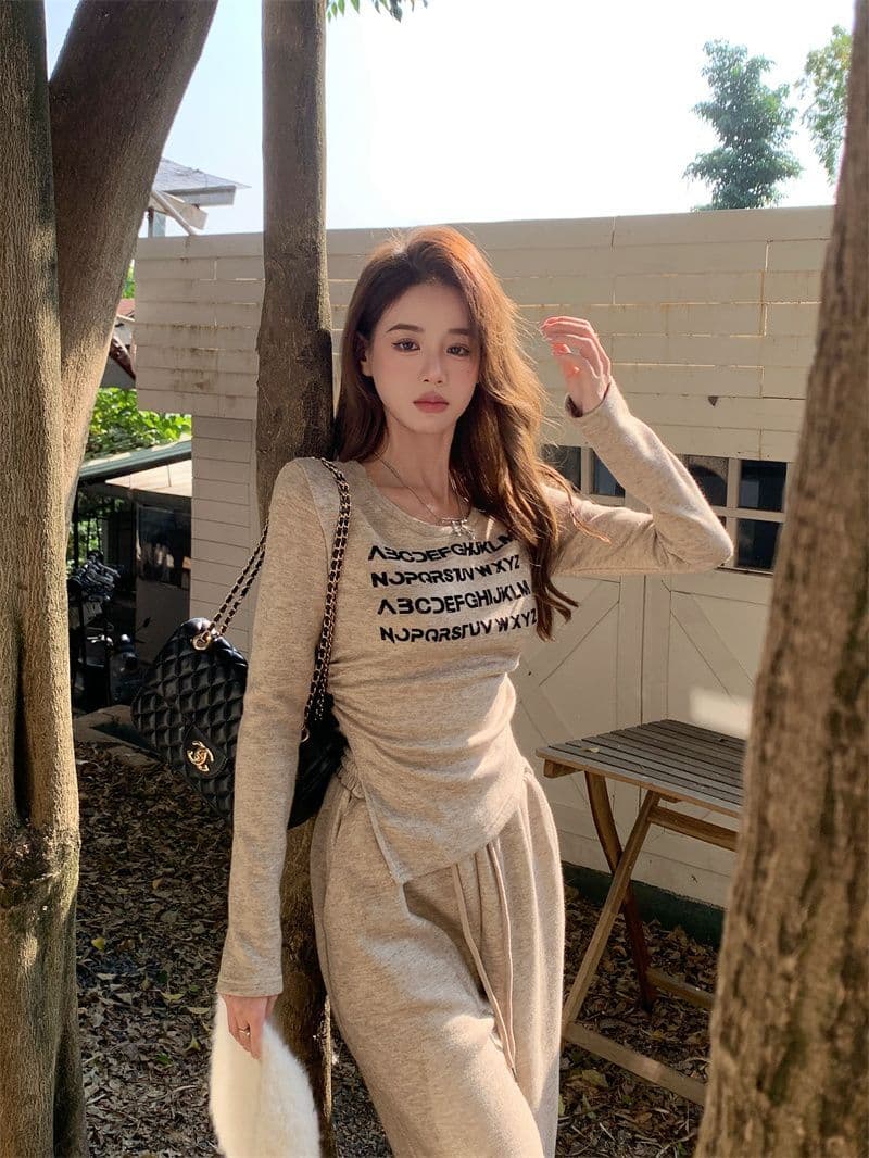 패션 세트 여성 가을 새로운 알파벳 프린트 몸매 가꾸기 불규칙 티셔츠 캐주얼 바지 세트 상세 이미지 17