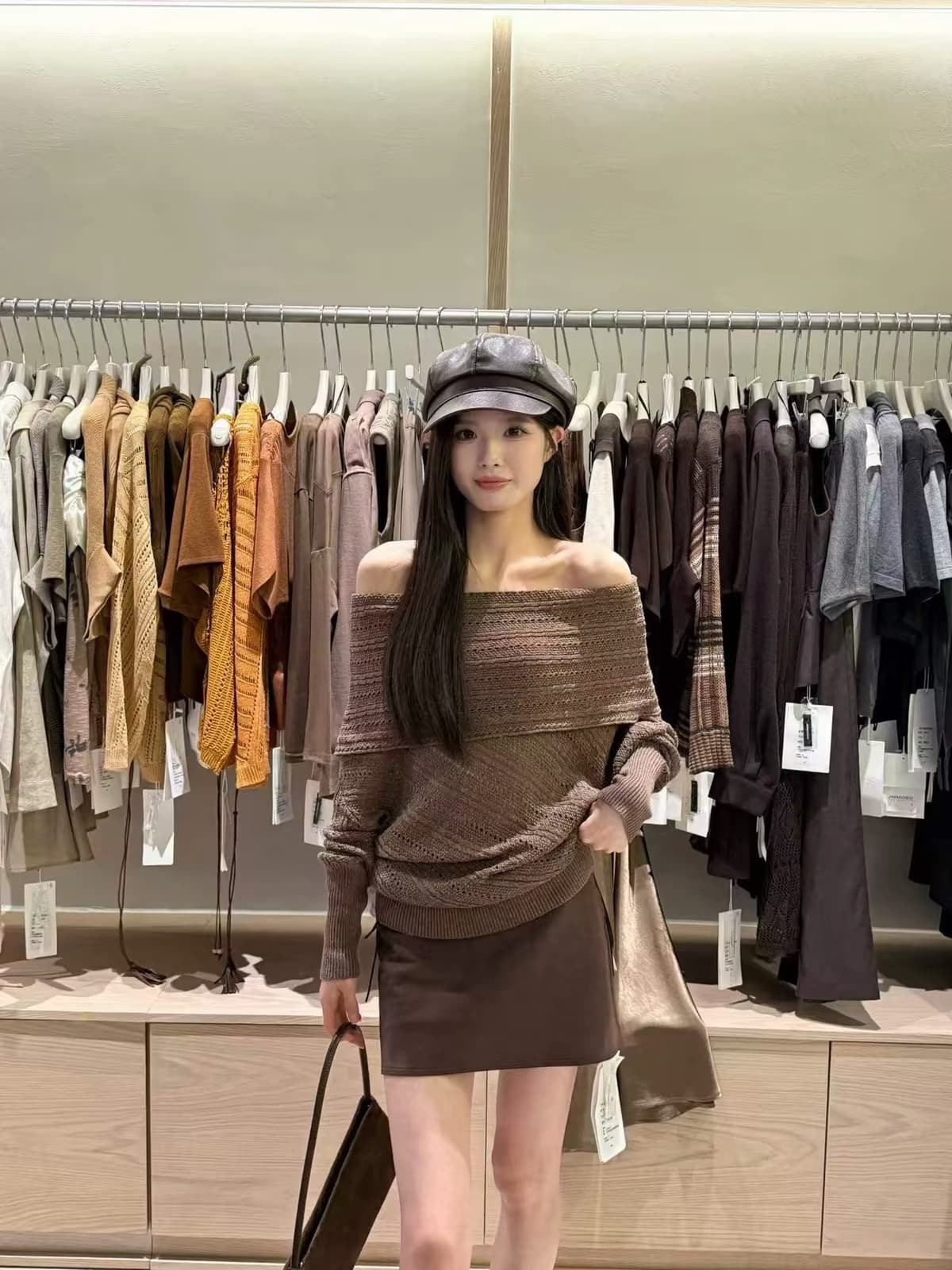 zy-2026 가을 새로운 고급 센스 홀로우 아웃 디자인 오프숄더 긴팔 니트 스웨터 여성 품격 오프숄더 스웨터
