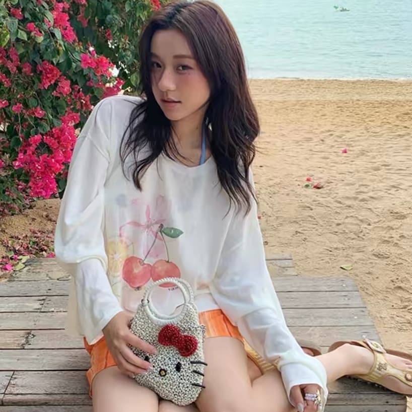 휴가 바람 체리 프린트 화이트 자외선 차단 티셔츠 여성 여름 느긋한 루즈핏 얇은 스타일 캐주얼 핫걸 바람 블라우스 맨위