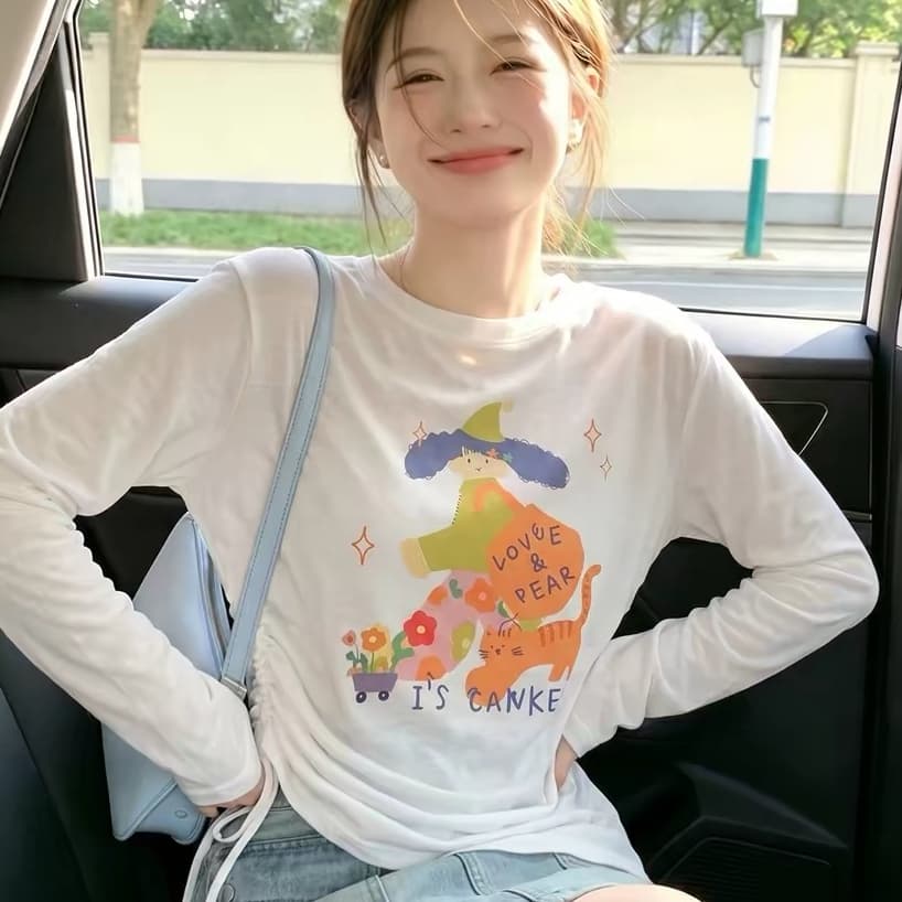 만화 프린트 펌프 로프 긴팔 티셔츠 여성 여름 새로운 슈퍼 화재 연령 감소 맨위 느긋한 바람 얇은 스타일 자외선 차단 블라우스 상세 이미지 1