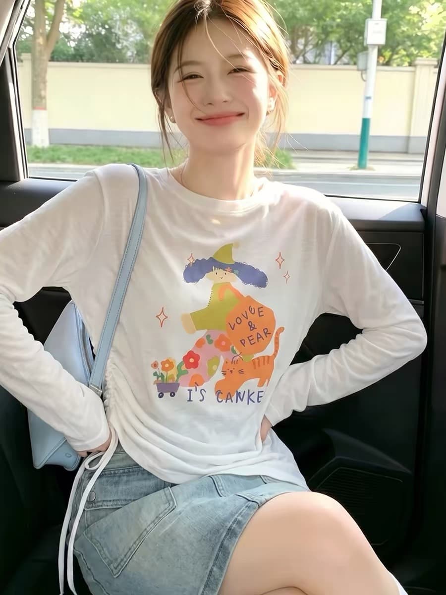 만화 프린트 펌프 로프 긴팔 티셔츠 여성 여름 새로운 슈퍼 화재 연령 감소 맨위 느긋한 바람 얇은 스타일 자외선 차단 블라우스 상세 이미지 3