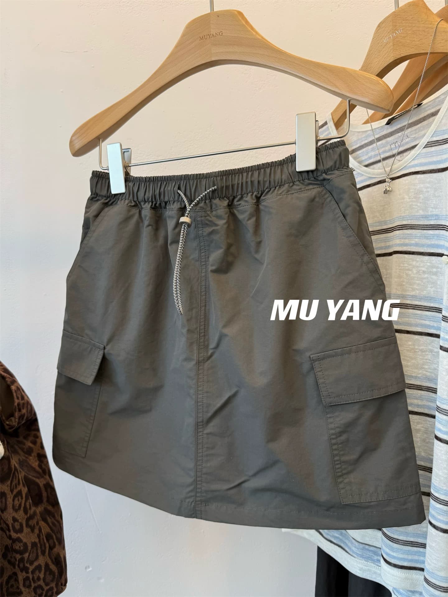 muyang 바람 불어 오는 중 여름 펌프 로프 주머니 품격 노출 방지 캐주얼 한 마디 반신 스커트 미니 스커트 여성 다용도 치마 상세 이미지 3