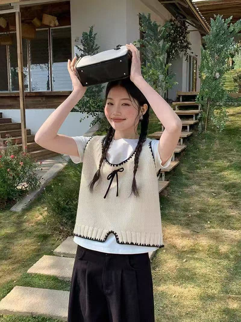 2026 년 가을 한 부서 달콤함 나비 매듭 조끼 라운드 넥 배색 니트 베스트 여성 짧은 스택 착용 기본 셔츠