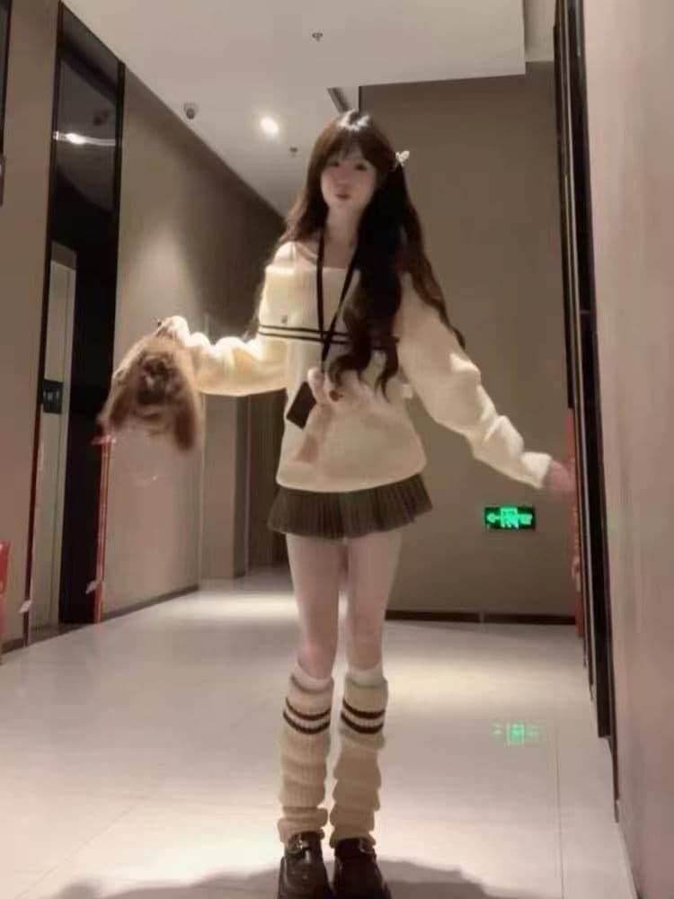 한 부서 느긋한 바람이 아닙니다. 규칙 오프숄더 스트라이프 맨위 여성 디자인 센스 루즈핏 오프숄더 스웨터 반신 치마 세트